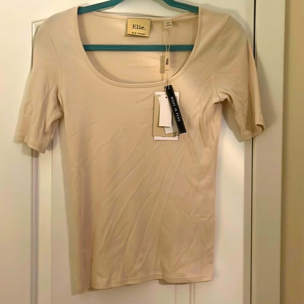 NWT Elie Tahari size XS cream colored women’s short sleeve shirt